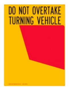 Do not overtake turning vehicle sign